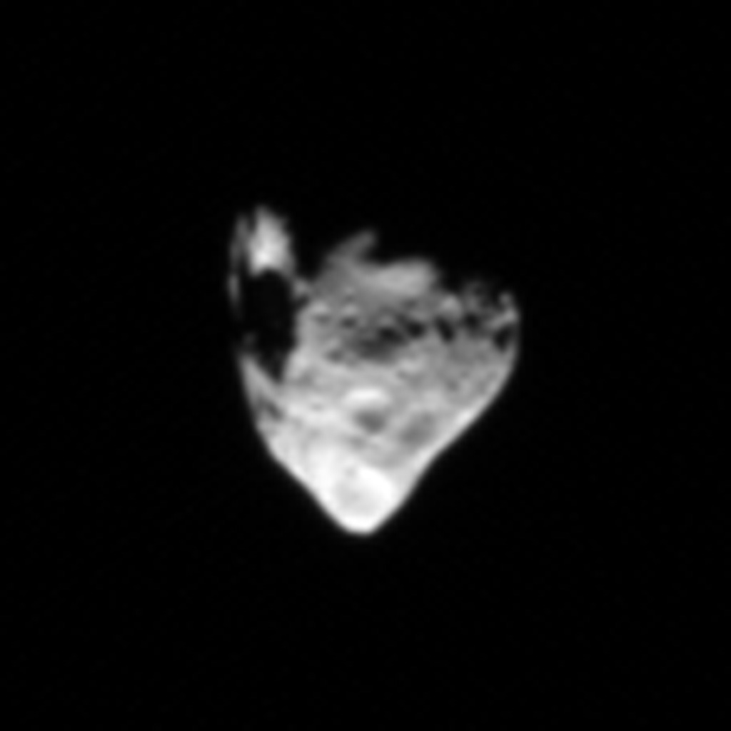 Šteins less than a minute after closest approach, 914 km away and lit from the side — the calibrated frame cropped, stretched and enlarged
